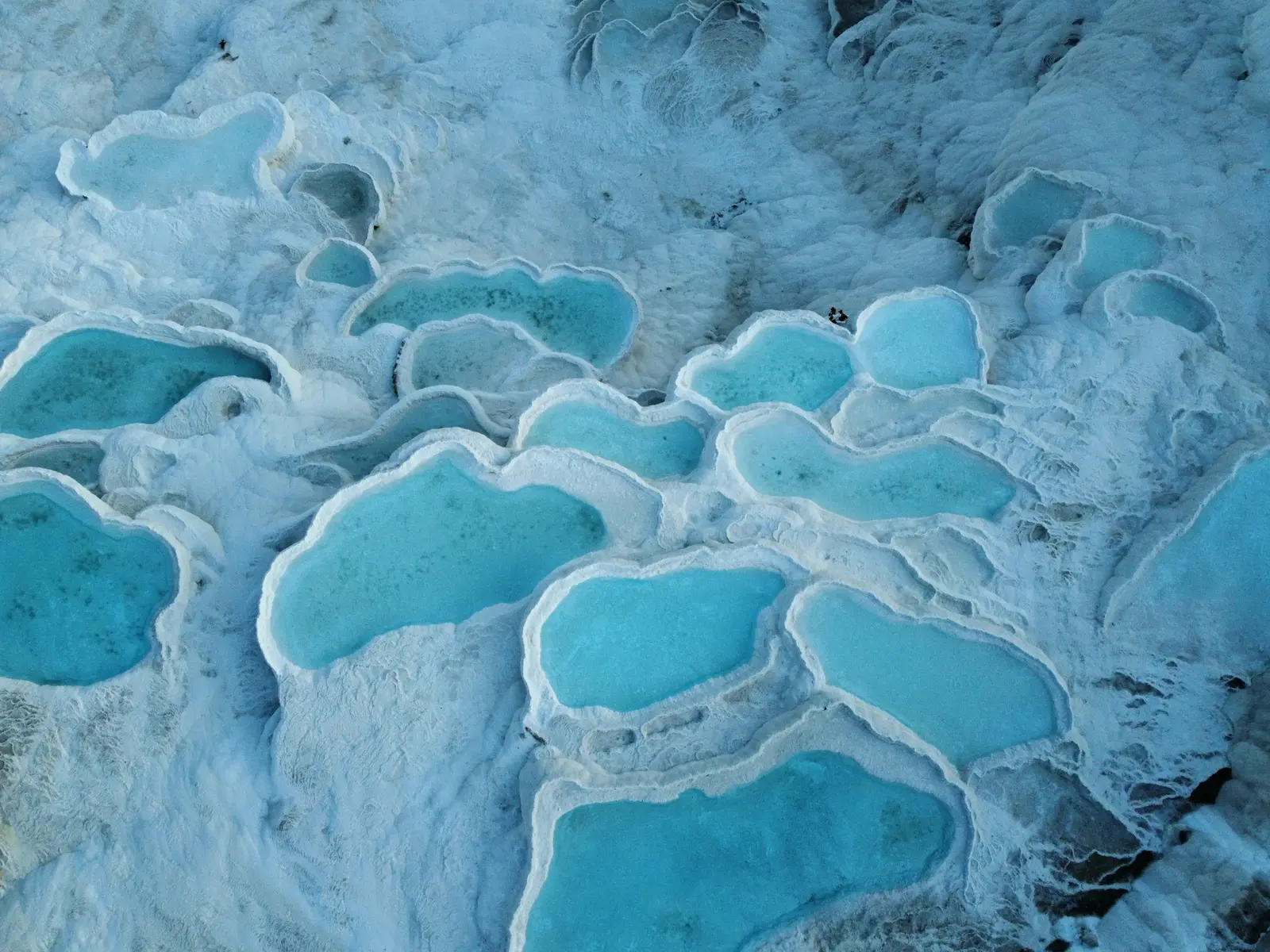 Turquoise travertine pools of Pamukkale seen from above